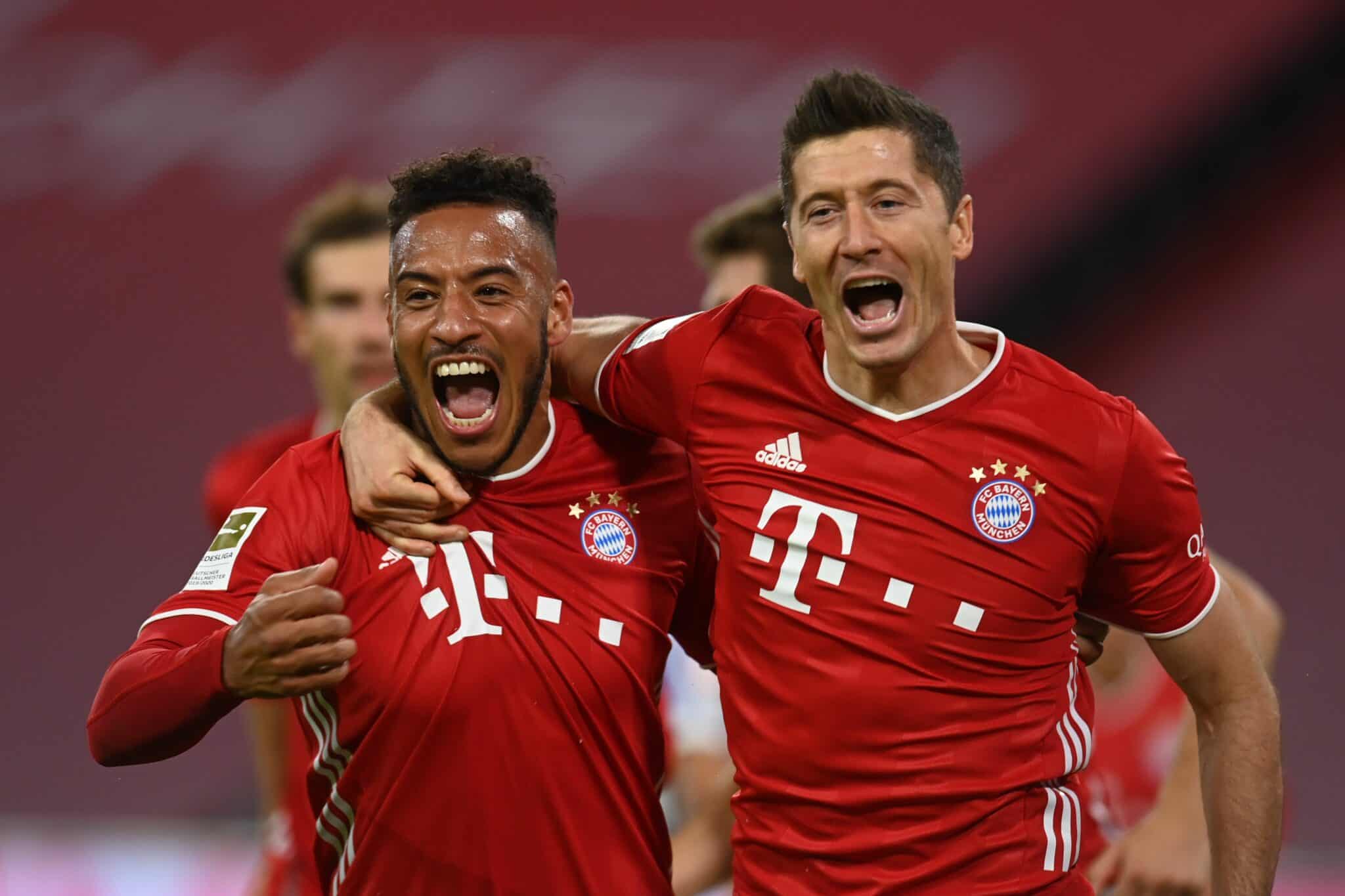 Corentin Tolisso und Robert Lewandowski