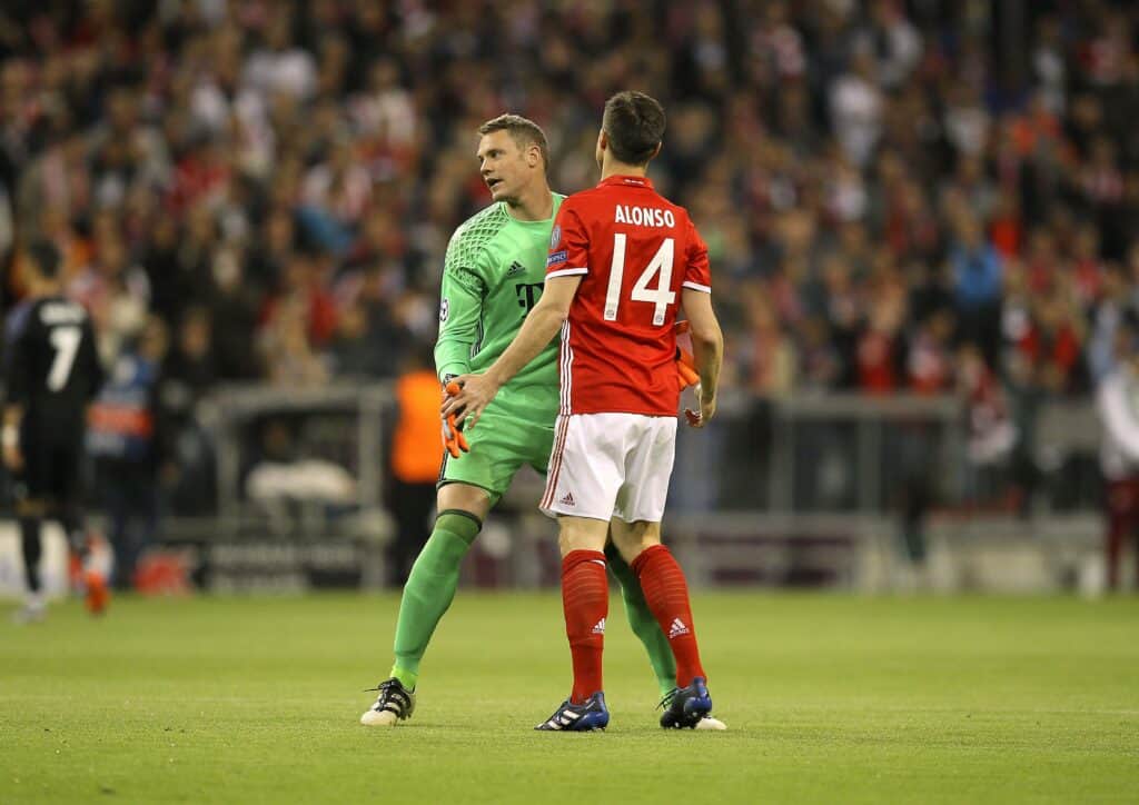 Manuel Neuer und Xabi Alonso